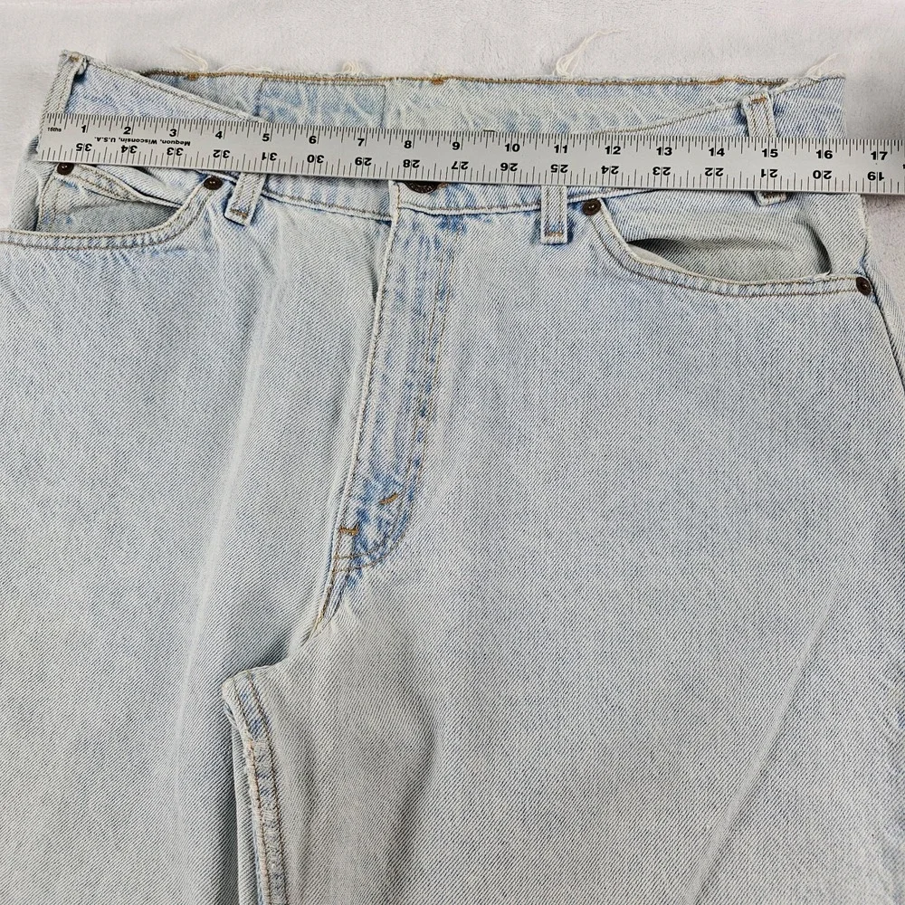 Vtg Levi's 560 Orange Tab Jeans 34x29 90s USA Loose Tapered Light Wash Raw Hem